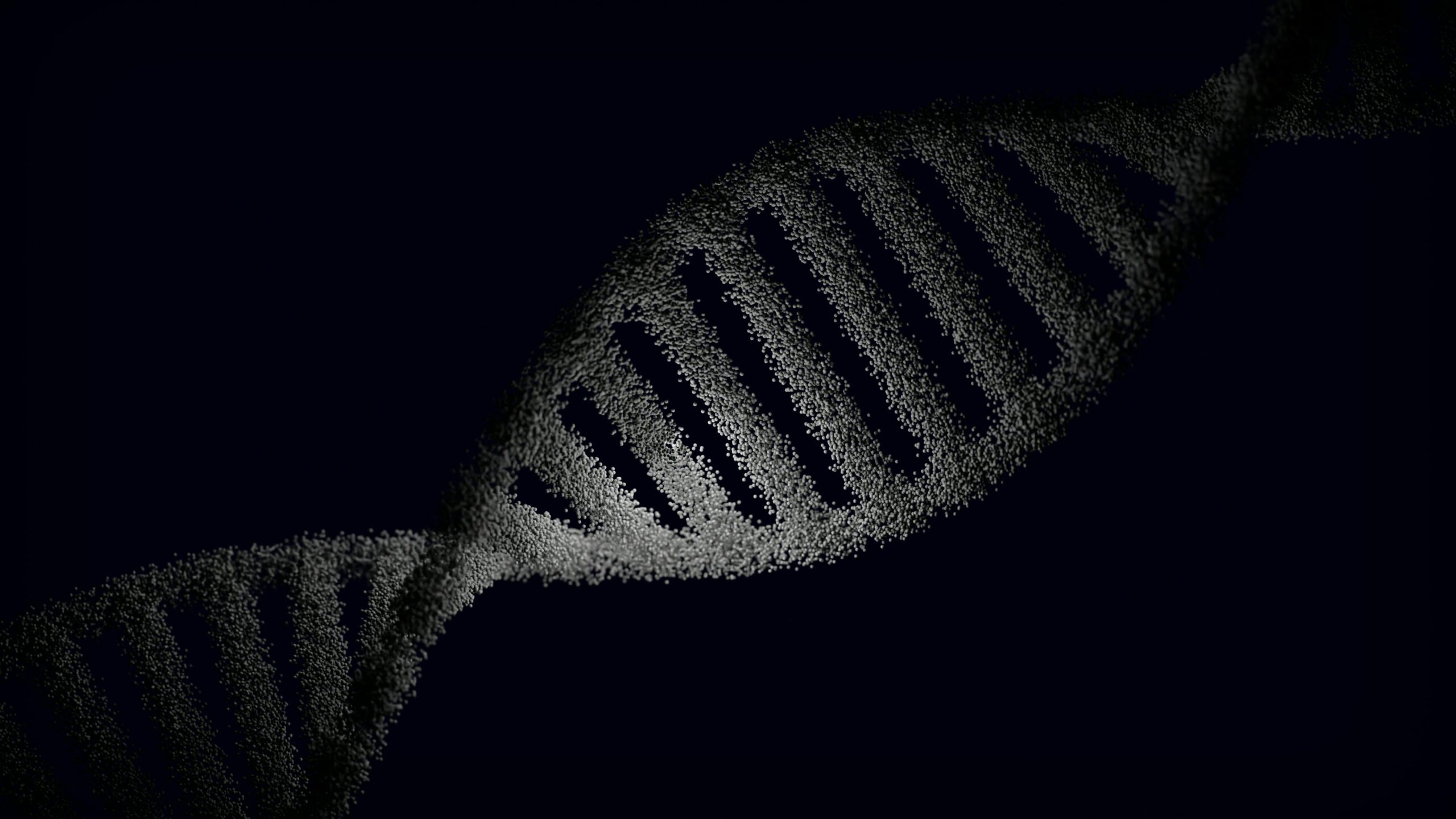 Artistic rendering of a DNA strand with particle effects against a dark background.